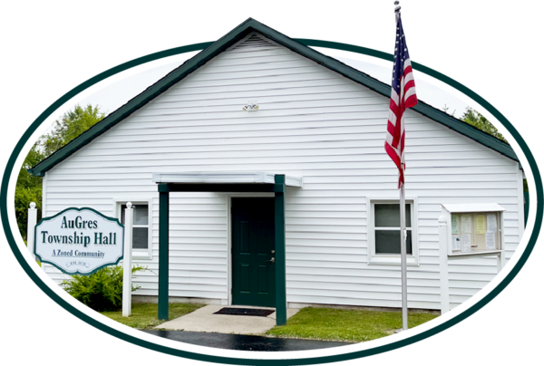 AuGres Township Hall with American flag.