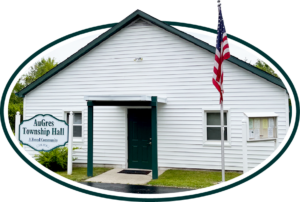 AuGres Township Hall with American flag, Michigan.