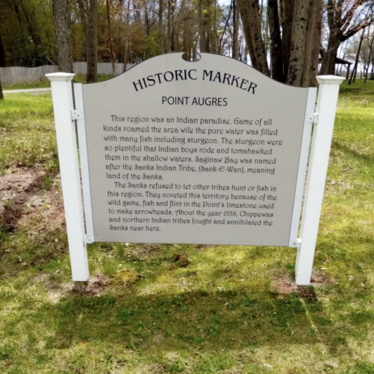 Historic marker for Point Augres in scenic park setting.